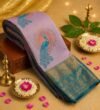 Elegant Mint Green Silk Saree with Dark Green Peacock Zari Motif and Rich Woven Border