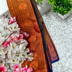Mustard Brown Lotus Motif Putta Emboss Saree