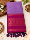 file_00000000e39881f5a0f7920c359a41c1 Checked Kalyani Cotton Saree – Lavender & Wine Purple with Zari Peacock Border