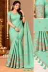 IMG-20261030-WA0100 Elegant Mint Green Georgette Grid Check Saree with Designer Peacock Blouse